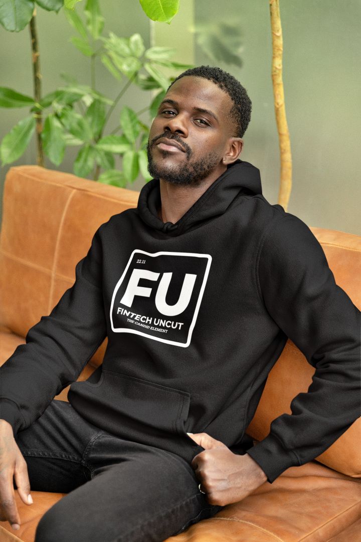 Young man wearing official black Fintech Uncut logo hoodie